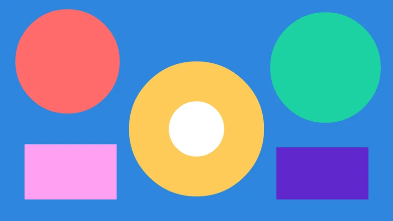 A blue stage with colorful circles, rectangles and a ring
